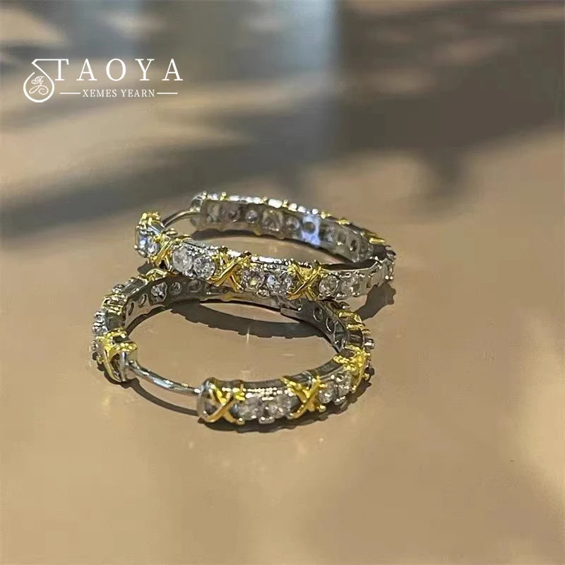 Kolczyki z wkładką w kolorze złotym i srebrnym z cyrkoniami