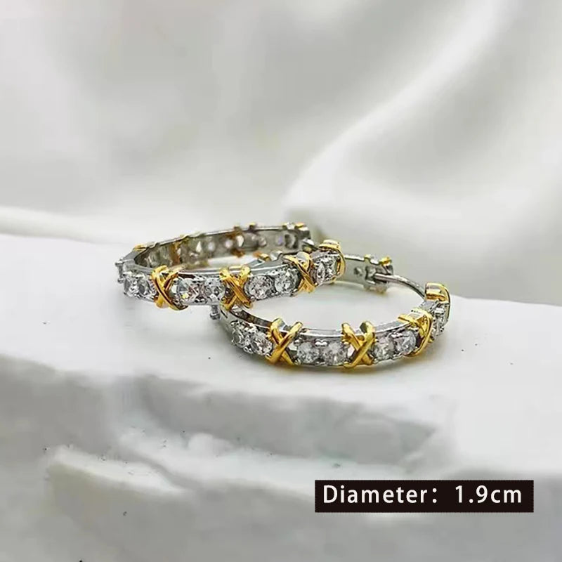 Kolczyki z wkładką w kolorze złotym i srebrnym z cyrkoniami