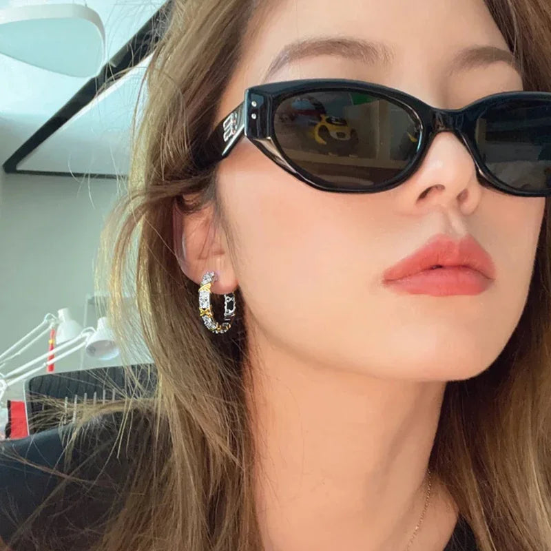 Kolczyki z wkładką w kolorze złotym i srebrnym z cyrkoniami